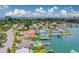 Serene waterfront community with beautiful homes, lush landscaping, and docks; enjoy a peaceful and relaxing coastal lifestyle at 362 41St Ave, St Pete Beach, FL 33706