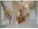 Bright entryway featuring white marble floors, a modern chandelier, and an elegant console table at 362 41St Ave, St Pete Beach, FL 33706