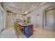 Bright kitchen with coffered ceiling, designer island, stainless appliances and ample cabinet space at 362 41St Ave, St Pete Beach, FL 33706