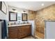 Bathroom features a double sink vanity with granite countertop and a tiled walk-in shower at 3802 Cloverhill Ct, Brandon, FL 33511