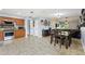Spacious living area with an open floor plan connecting the kitchen, dining room, and living room at 3802 Cloverhill Ct, Brandon, FL 33511