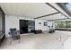 The screened in lanai provides a shady spot to relax beside the pool at 3802 Cloverhill Ct, Brandon, FL 33511