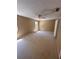 Spacious bedroom features neutral walls, carpet, and a ceiling fan for added comfort at 4624 W North B St, Tampa, FL 33609