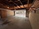 Uncluttered garage interior with a view outside and a set of cabinets for storage at 4624 W North B St, Tampa, FL 33609