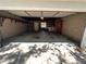 Spacious garage interior features concrete block walls, built-in cabinets, and laundry hookups at 4624 W North B St, Tampa, FL 33609