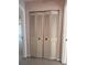 Hallway closet with folding doors, providing extra storage at 4624 W North B St, Tampa, FL 33609