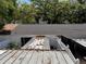 View of roof tops and tree tops, with shade and light at 4624 W North B St, Tampa, FL 33609