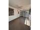 Screened porch with an installed ceiling fan at 4624 W North B St, Tampa, FL 33609