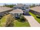 Charming two-story home featuring a landscaped front yard and a paved driveway for curb appeal at 4777 Ballantrae Blvd, Land O Lakes, FL 34638