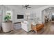 Cozy living room with light colors, modern furniture, and hardwood floors at 4777 Ballantrae Blvd, Land O Lakes, FL 34638