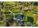 An aerial view of a community park featuring walking paths and covered picnic area at 4777 Ballantrae Blvd, Land O Lakes, FL 34638