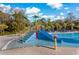 Community pool area featuring a slide and shallow water, perfect for Gathering fun at 4777 Ballantrae Blvd, Land O Lakes, FL 34638