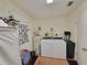 Laundry area featuring a washer, dryer, and water heater at 523 Oakbriar Pl, Brandon, FL 33510