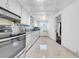 Functional kitchen featuring modern appliances, ample counter space, and stylish backsplash at 5241 4Th S St, St Petersburg, FL 33705