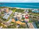 Aerial view of condo community near pristine beach, offering a serene coastal lifestyle with easy access to the water at 615 10Th Ne Ave # 1, St Petersburg, FL 33701