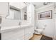 Stylish bathroom showcases a modern vanity, toilet, and decorative accents at 615 10Th Ne Ave # 1, St Petersburg, FL 33701