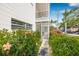 Attractive home exterior with vibrant landscaping and a welcoming entrance at 615 10Th Ne Ave # 1, St Petersburg, FL 33701