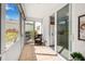 Sunroom with access to kitchen and outdoor garden at 615 10Th Ne Ave # 1, St Petersburg, FL 33701