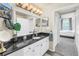 Well-lit bathroom features dark countertops and a combined bathtub and shower at 700 S Harbour Island Blvd # 231, Tampa, FL 33602