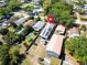 Aerial shot of a residential area showcasing homes with solar panels and well-maintained yards at 753 Almeda N St, St Petersburg, FL 33702