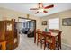 Inviting dining room with a wooden table set and view into the spacious living area at 753 Almeda N St, St Petersburg, FL 33702
