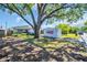 The property is a single-story home with mature landscaping and a PODS moving and storage container at 753 Almeda N St, St Petersburg, FL 33702