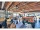 Spacious garage interior with exposed ceiling beams and ample storage space at 753 Almeda N St, St Petersburg, FL 33702