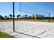 Community sand volleyball court with the net up and waiting for a game at 8086 Painted Sky Pl, Land O Lakes, FL 34637