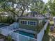 Overhead of home with a fenced in backyard and swimming pool at 912 N Roux St, Plant City, FL 33563