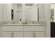 Bathroom with dual vanity sinks and granite countertops at 9255 Bonita Mar Dr, Parrish, FL 34219