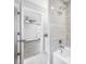 Partial view of bathroom vanity with view to bedroom featuring hardwood floors, lighting, and natural light at 1030 11Th S Ave, St Petersburg, FL 33705