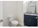 Half bath with granite countertop and modern fixtures at 1030 11Th S Ave, St Petersburg, FL 33705