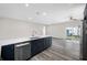Kitchen island featuring sleek countertops, stainless steel appliances, and modern faucet at 1030 11Th S Ave, St Petersburg, FL 33705