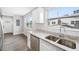 Bright kitchen showcasing granite countertops, stainless steel appliances, and ample natural light at 1030 11Th S Ave, St Petersburg, FL 33705