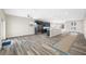 Bright and open living room with modern floors and recessed lighting at 1030 11Th S Ave, St Petersburg, FL 33705