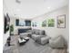 Cozy living room featuring a comfortable sectional sofa and wet bar area at 1030 11Th S Ave, St Petersburg, FL 33705
