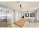 Open kitchen with a center island, stainless steel appliances, and adjacent breakfast nook at 10530 Maronda Dr, Riverview, FL 33569