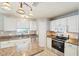 Well-appointed kitchen with granite countertops, stainless steel appliances, and ample storage space at 10530 Maronda Dr, Riverview, FL 33569