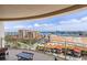 Enjoy the city view from this balcony featuring comfortable seating and tiled flooring at 11 Baymont St # 1109, Clearwater Beach, FL 33767