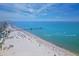 Gorgeous aerial view of a pristine white sand beach and pier on the Gulf Coast of Florida at 11 Baymont St # 1109, Clearwater Beach, FL 33767