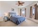 Bedroom with water views, carpeted floors, and light blue bedding at 11 Baymont St # 1109, Clearwater Beach, FL 33767