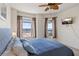 Bedroom with water views, carpeted floors, and mounted tv at 11 Baymont St # 1109, Clearwater Beach, FL 33767