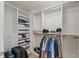 Spacious walk-in closet with ample shelving and hanging space for organized storage at 11 Baymont St # 1109, Clearwater Beach, FL 33767
