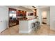 Contemporary kitchen featuring stainless steel appliances and an eat-in bar area with seating at 11 Baymont St # 1109, Clearwater Beach, FL 33767