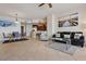 Open living space with dining area, kitchen, and cozy seating with water view access at 11 Baymont St # 1109, Clearwater Beach, FL 33767