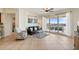 Cozy living room with water views, comfortable seating, and access to a spacious balcony at 11 Baymont St # 1109, Clearwater Beach, FL 33767