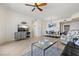 Open living space with tile flooring, dining area and water view access at 11 Baymont St # 1109, Clearwater Beach, FL 33767