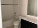 Full bathroom includes a tub and shower combination with a sink at 11624 Fringetree Ct, Riverview, FL 33579