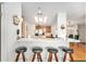 Kitchen and dining area featuring barstool seating and modern appliances at 12501 Ulmerton Rd # 133, Largo, FL 33774
