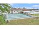 Outdoor shuffleboard courts with covered seating offering an enjoyable recreational space for residents at 12501 Ulmerton Rd # 133, Largo, FL 33774
